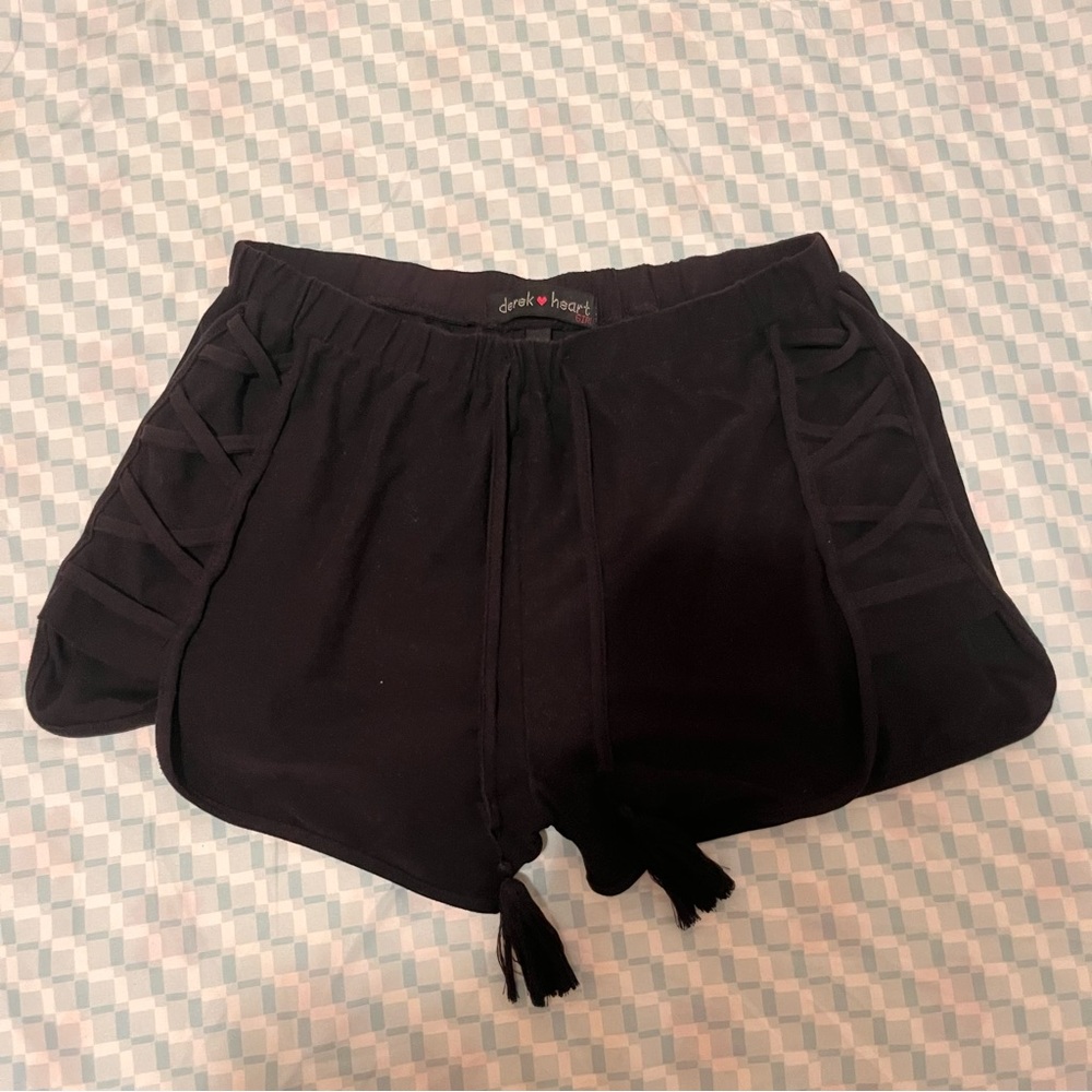 Black soft drawstring shorts with criss cross detail